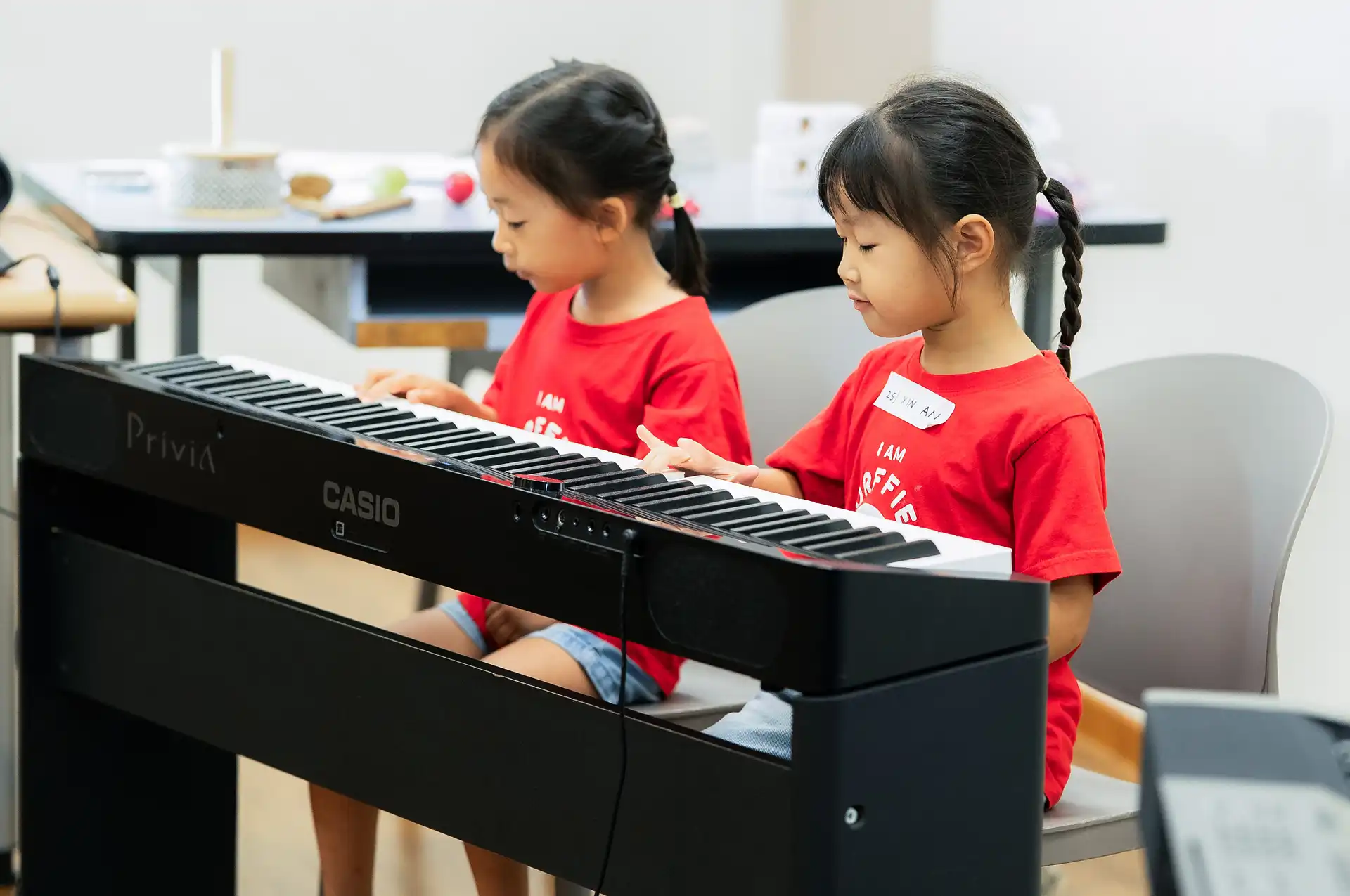 kids playing piano